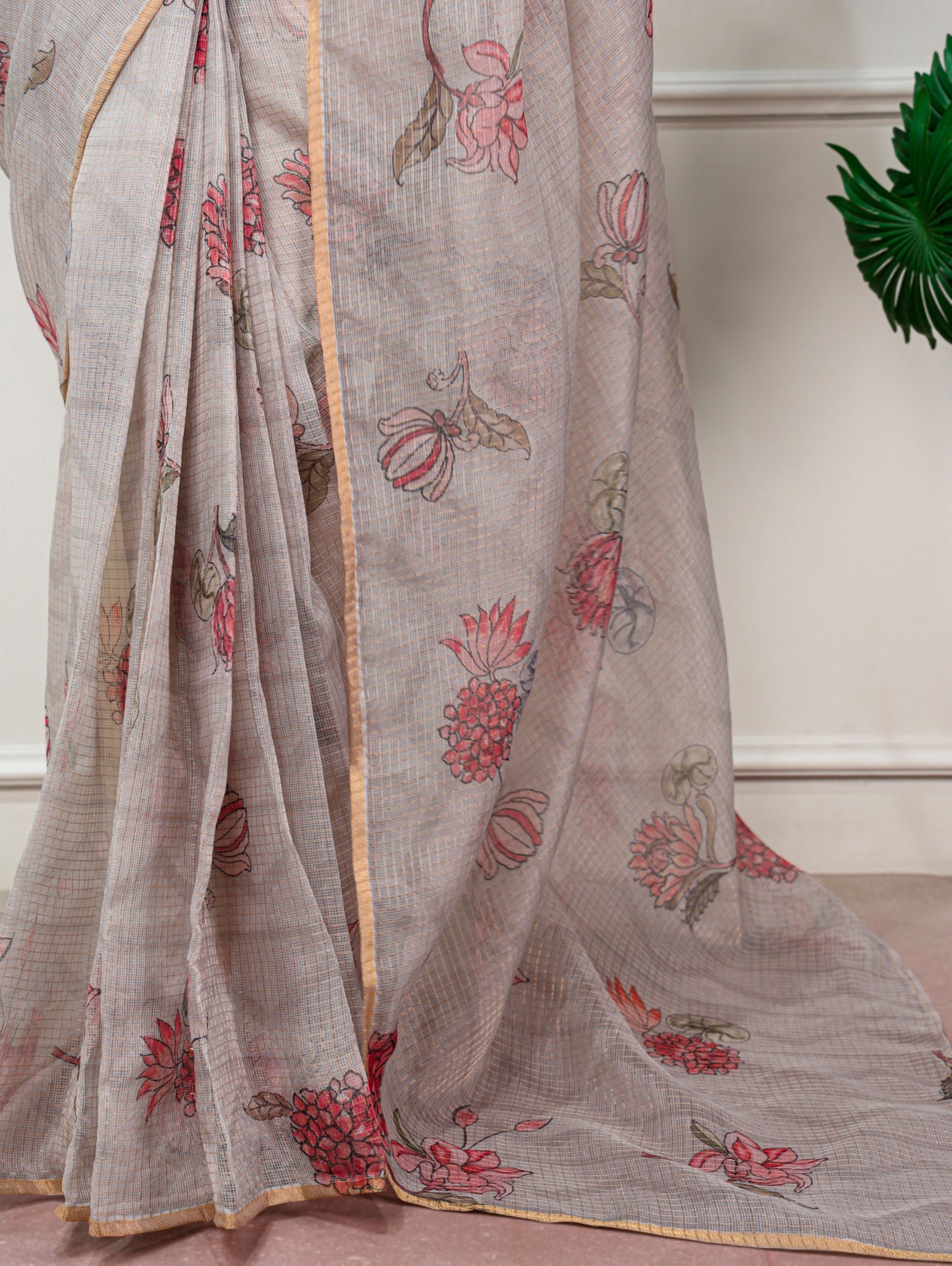 A Kota Doria saree designed to keep you stylish, confident, and graceful wherever you go.