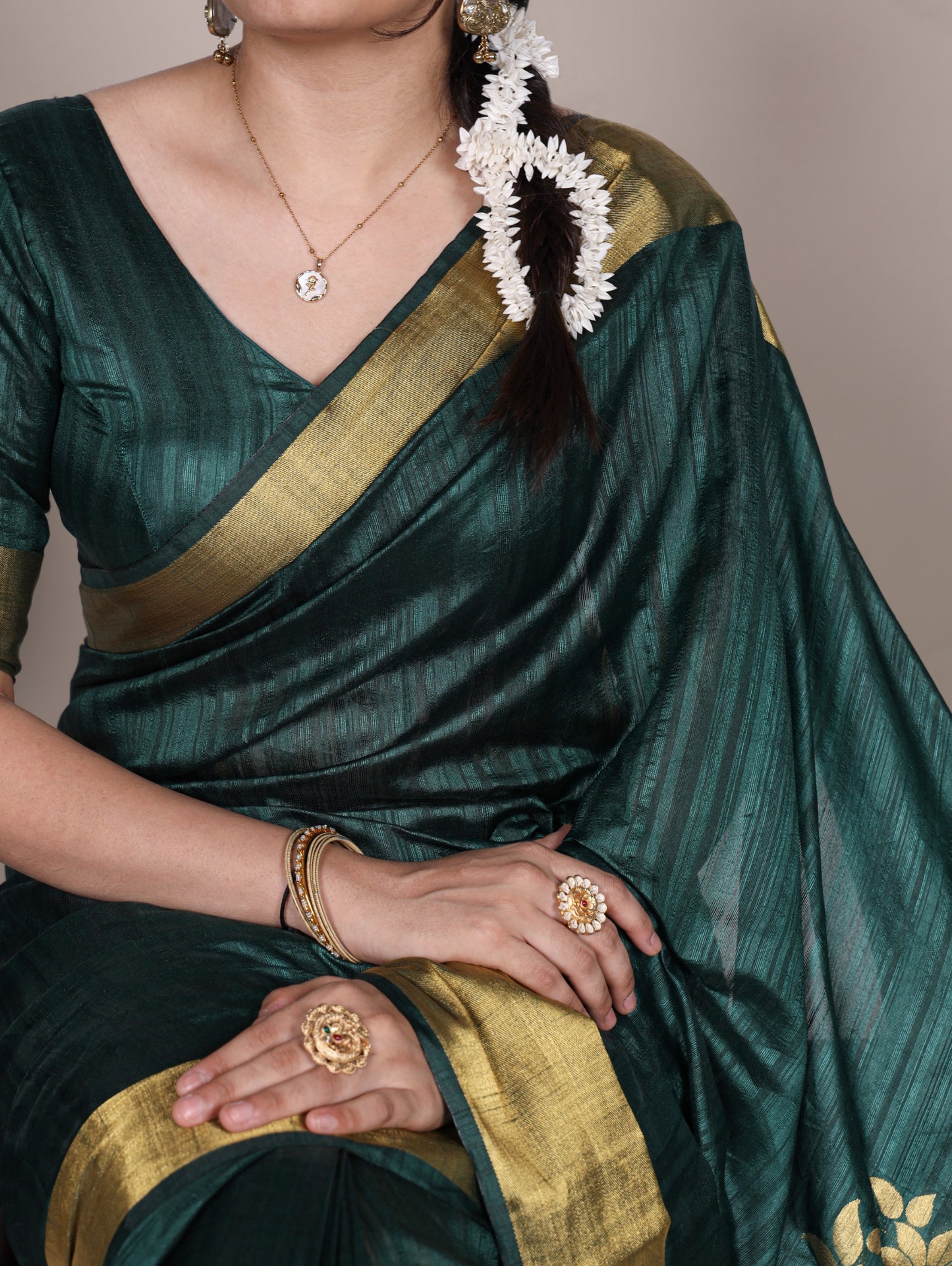 Dressing up for Onam in a raw silk saree that reflects the beauty of Kerala traditions and celebrations.🦚