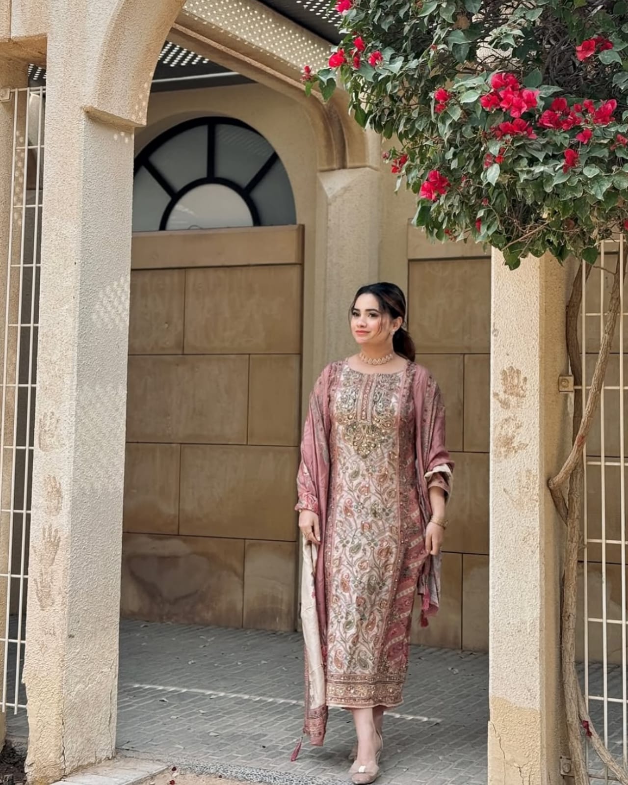 Paisley Printed salwar suit with Coin-Tassel Details