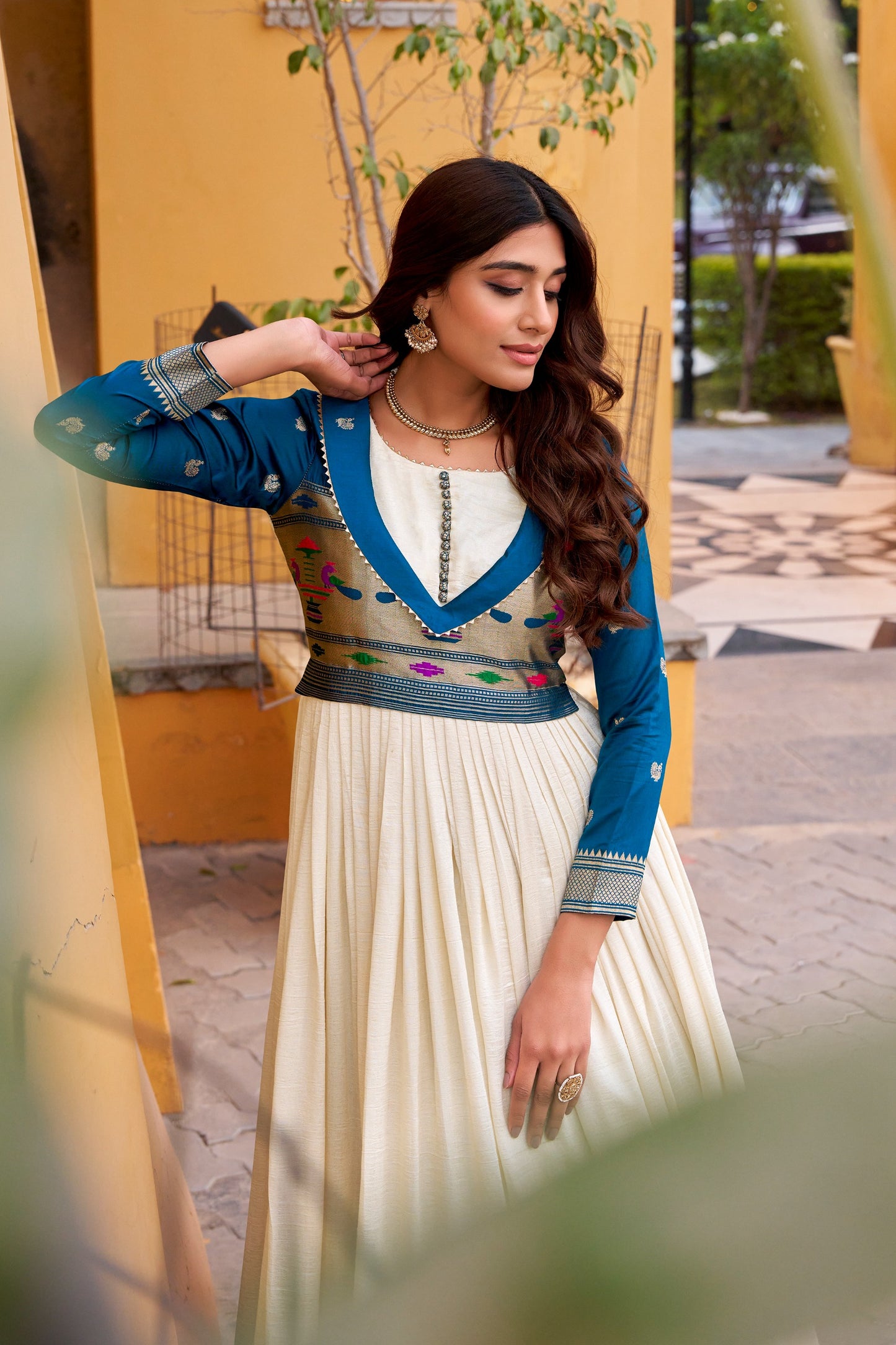 An elegant blend of comfort and tradition, designed in luxurious Vichitra Silk with a beautifully flowing flair