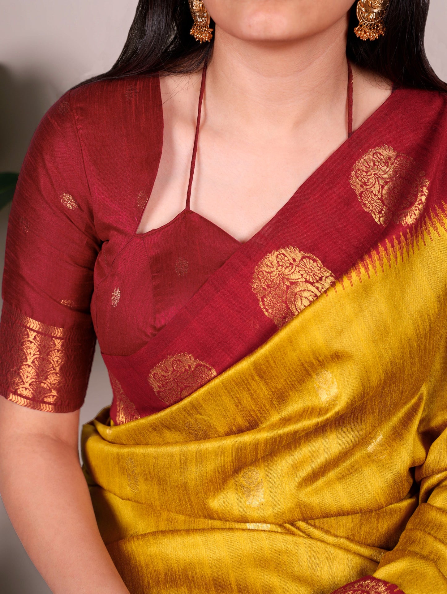 The smooth poly cotton fabric paired with beautiful zari weaving makes this saree a graceful choice for festive and ethnic occasions