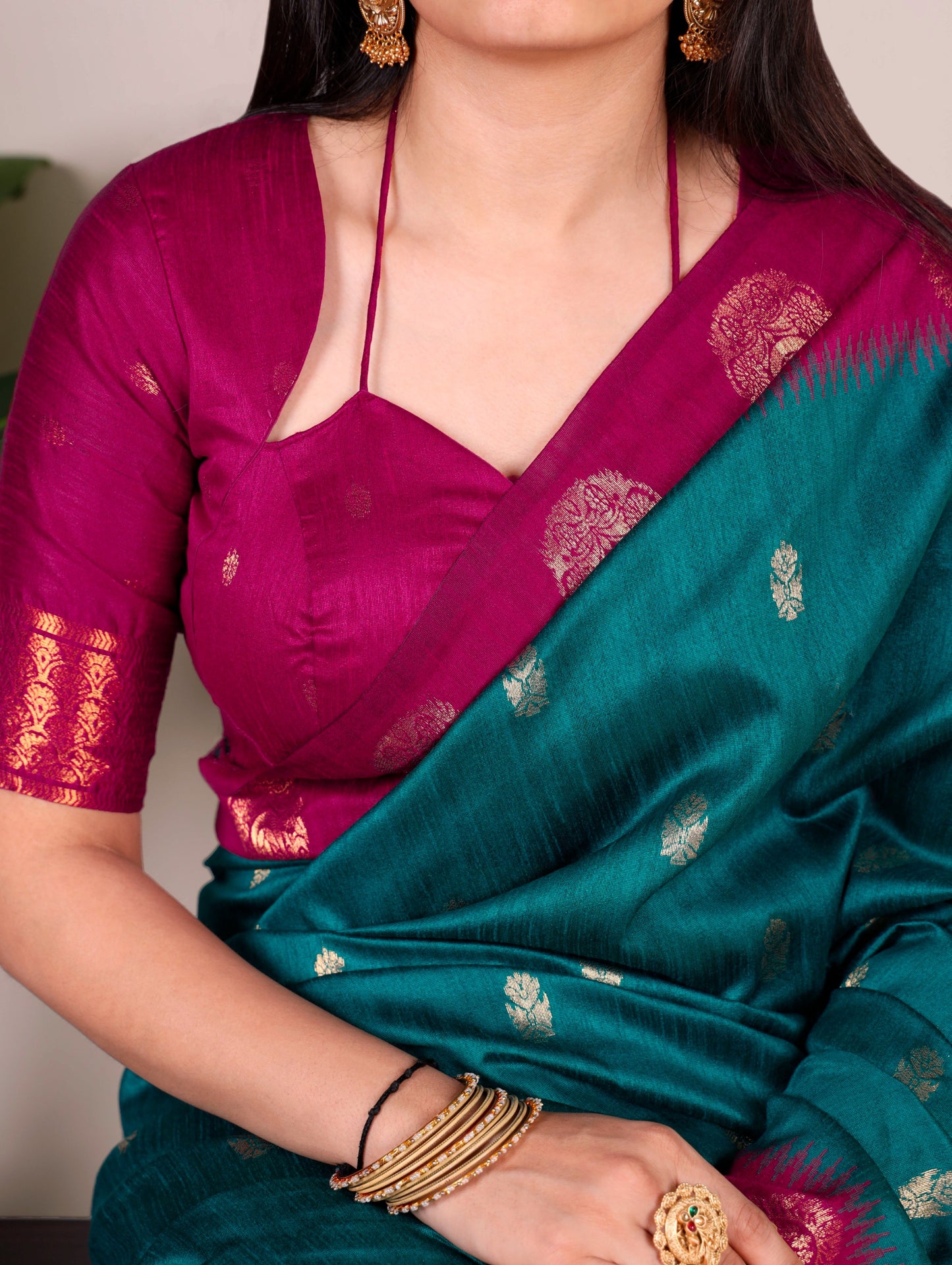 The smooth poly cotton fabric paired with beautiful zari weaving makes this saree a graceful choice for festive and ethnic occasions