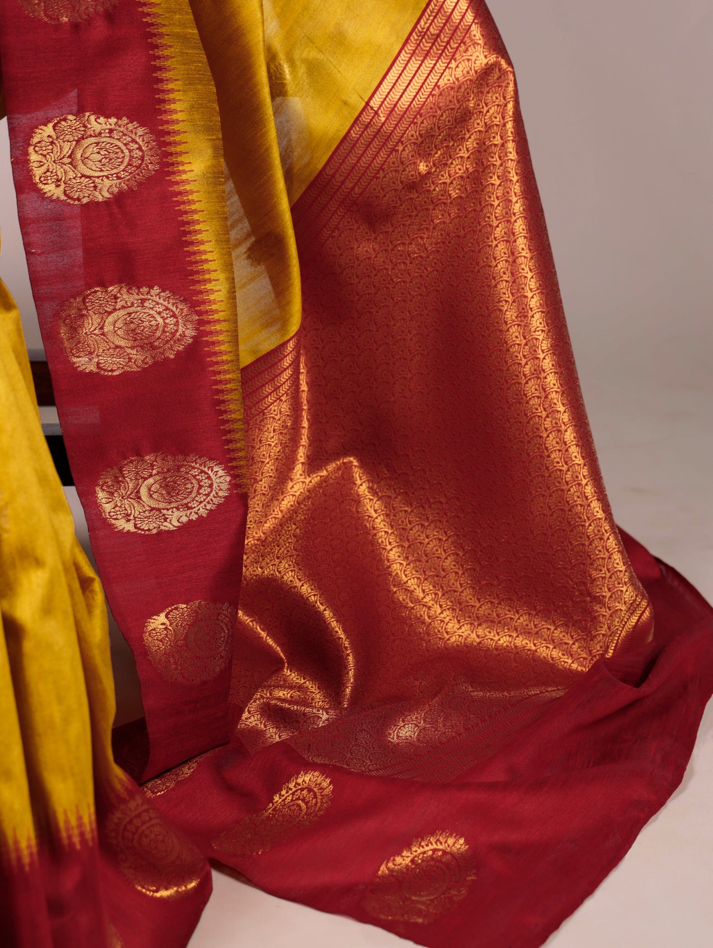 The smooth poly cotton fabric paired with beautiful zari weaving makes this saree a graceful choice for festive and ethnic occasions