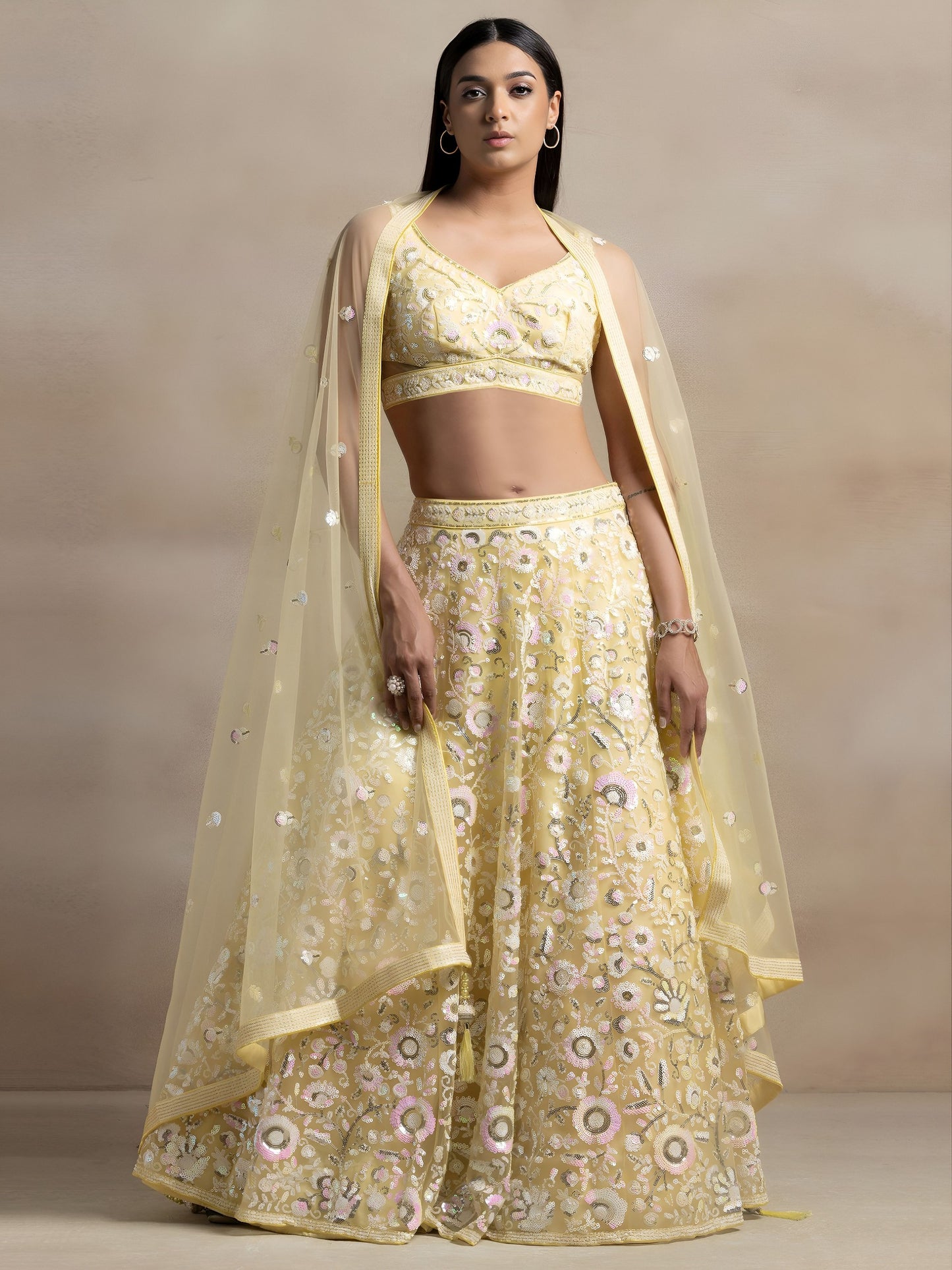 Women's Semi-Stitched Lehenga in Pastel Yellow Soft Net with Thread & Sequins Embroidery