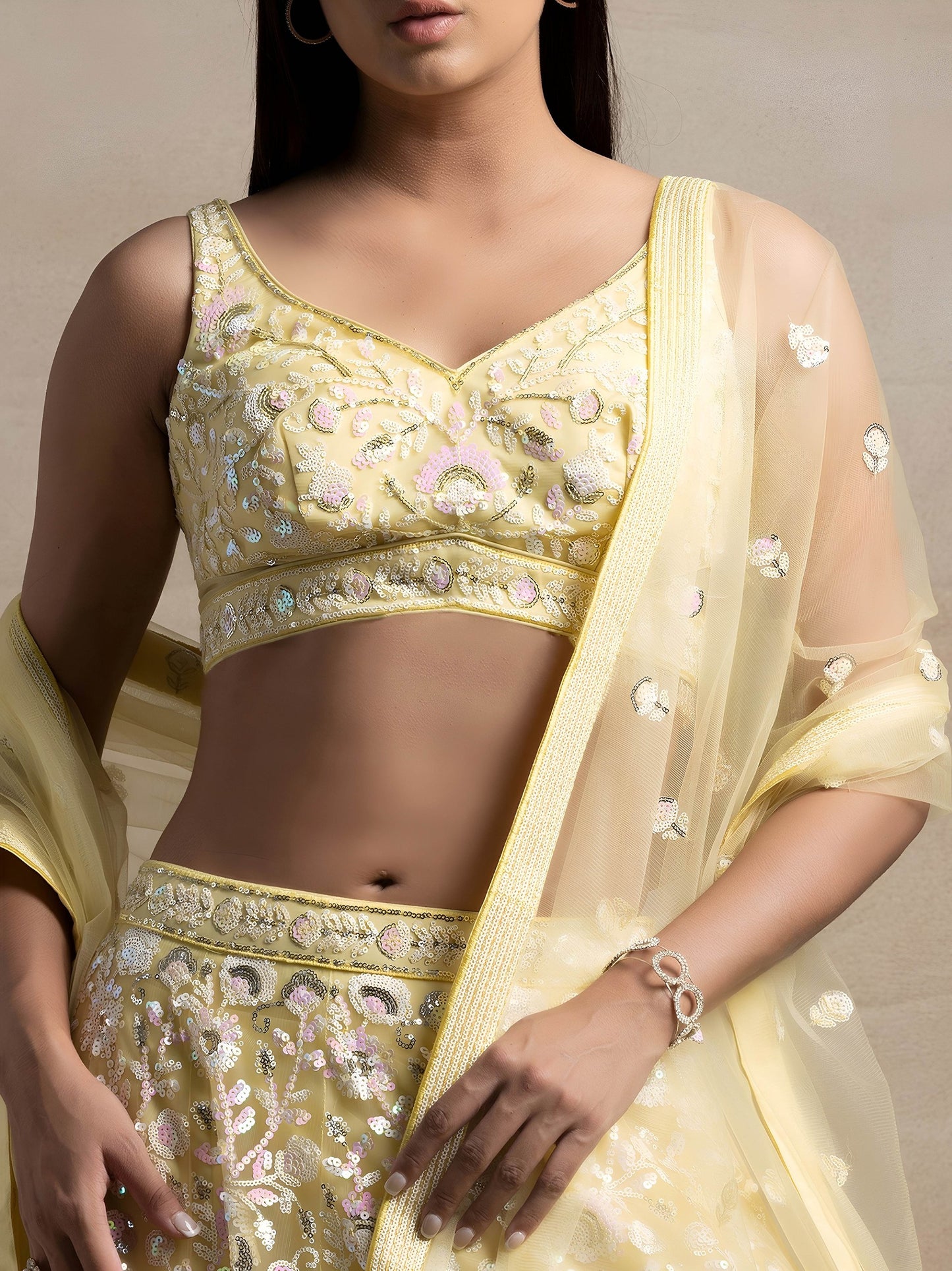 Women's Semi-Stitched Lehenga in Pastel Yellow Soft Net with Thread & Sequins Embroidery