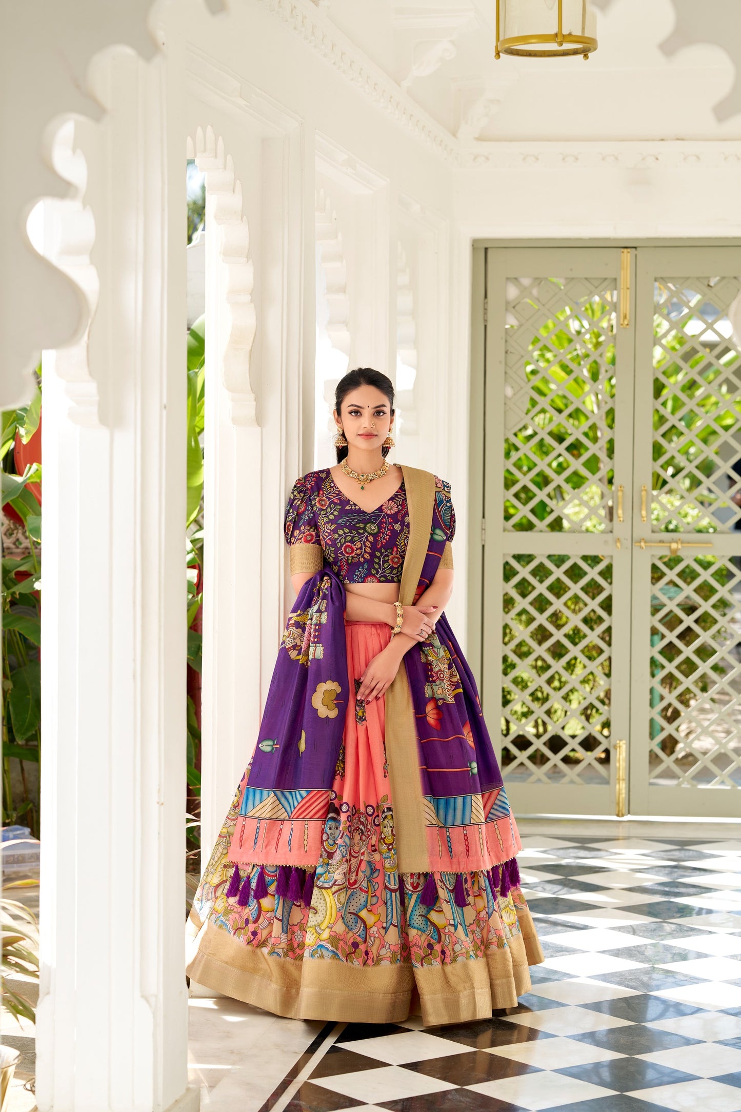 Adorned in the elegance of Dola Silk and the intricate charm of Kalamkari prints, the lehenga choli whispers tales of tradition and beauty💐.