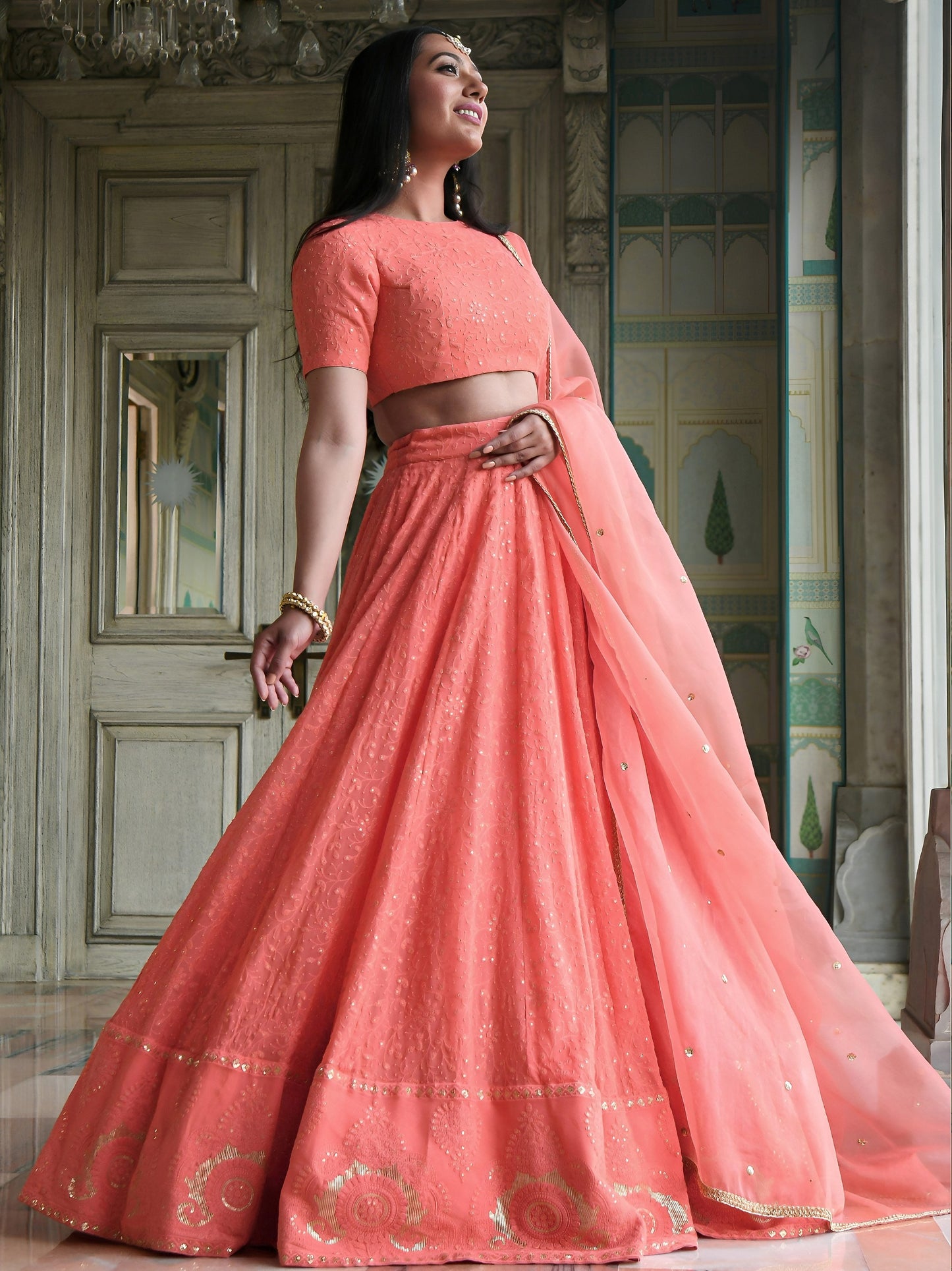 Women's Lehenga in Peach Coral Georgette with Thread & Sequins Embroidery