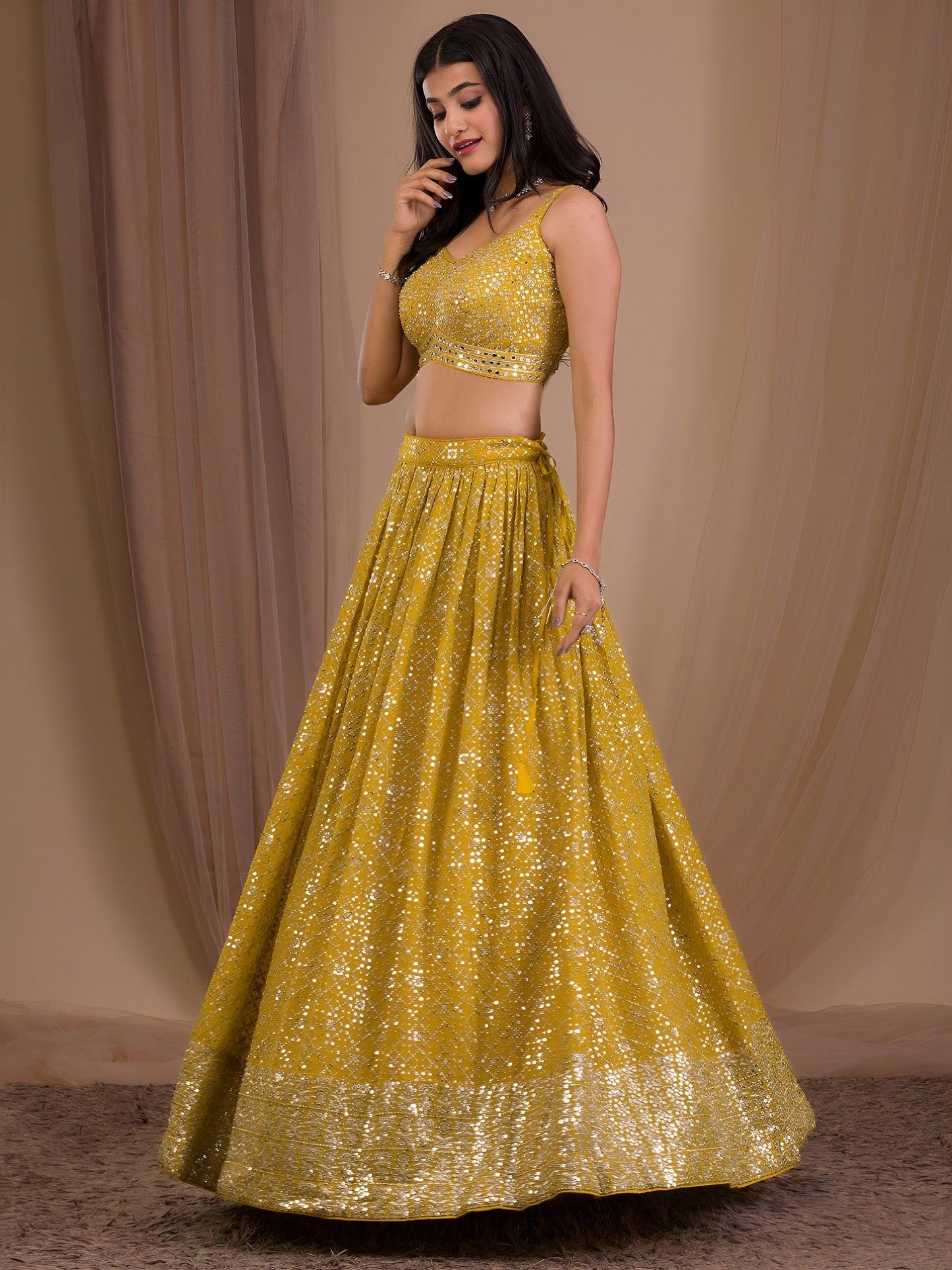 Women's Lehenga in Mustard Yellow Georgette with Zari & Multiple Sequins Embroidery