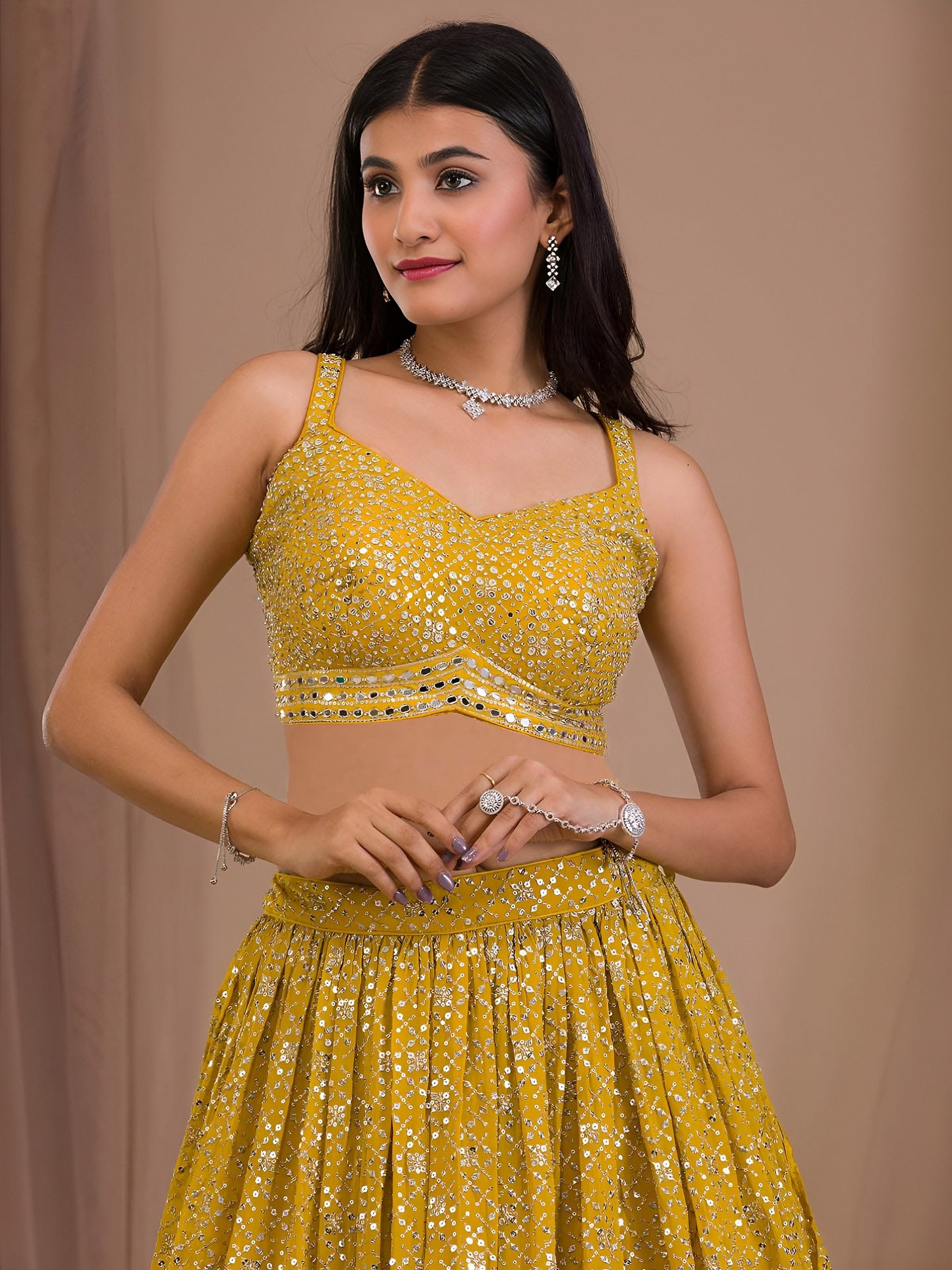 Women's Lehenga in Mustard Yellow Georgette with Zari & Multiple Sequins Embroidery