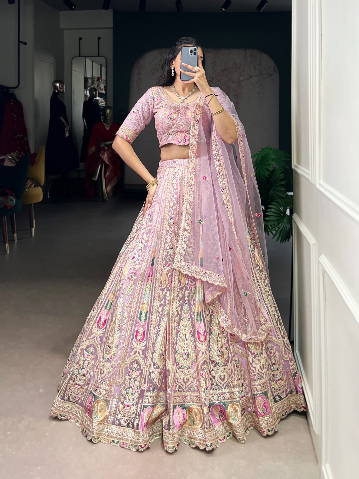 Women's Lehenga Choli in Lavender Net with Sequins and Thread Embroidery