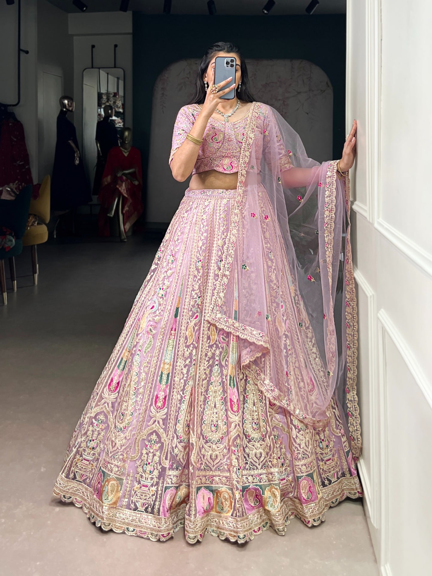 Women's Lehenga Choli in Lavender Net with Sequins and Thread Embroidery