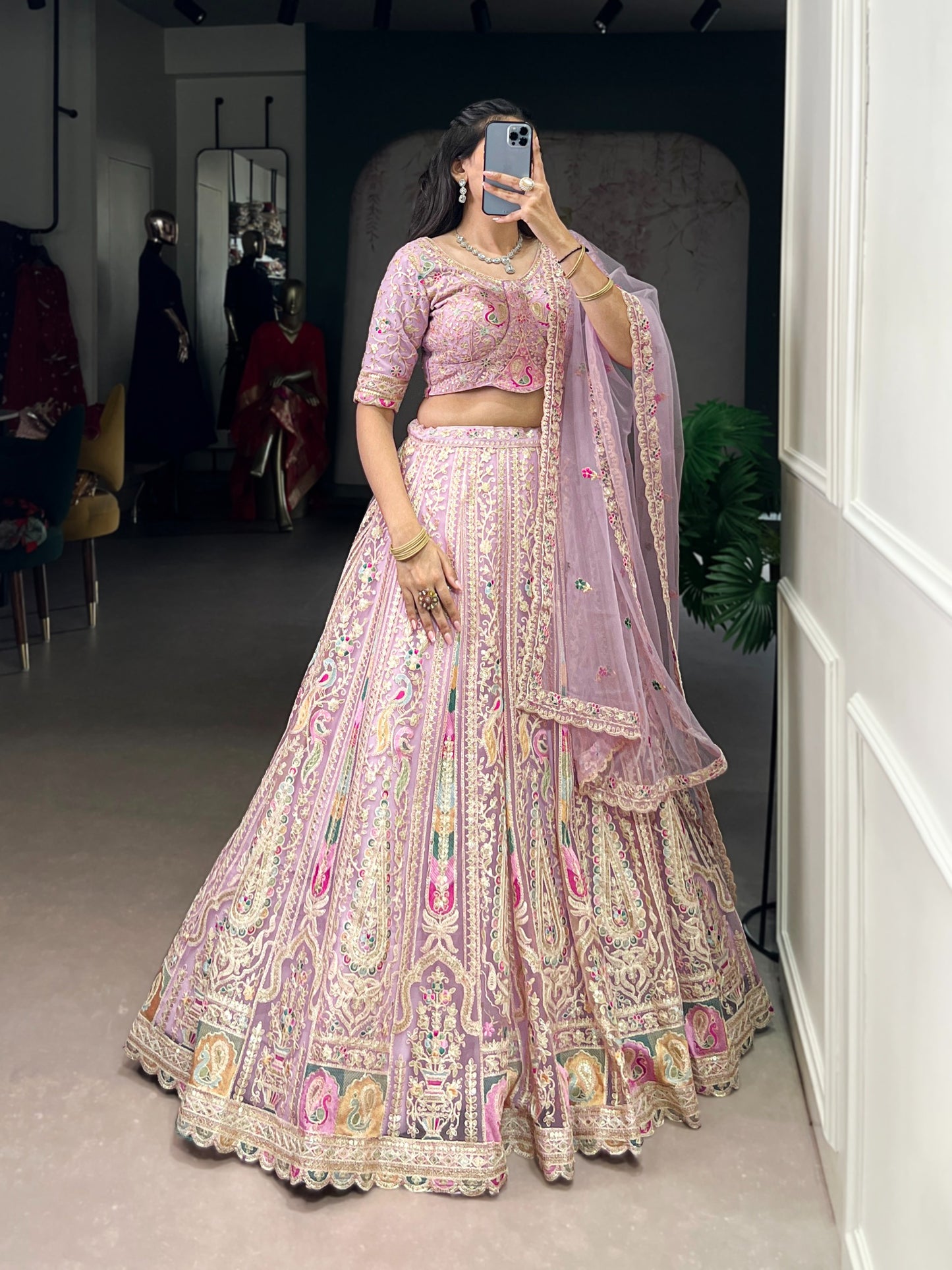 Women's Lehenga Choli in Lavender Net with Sequins and Thread Embroidery