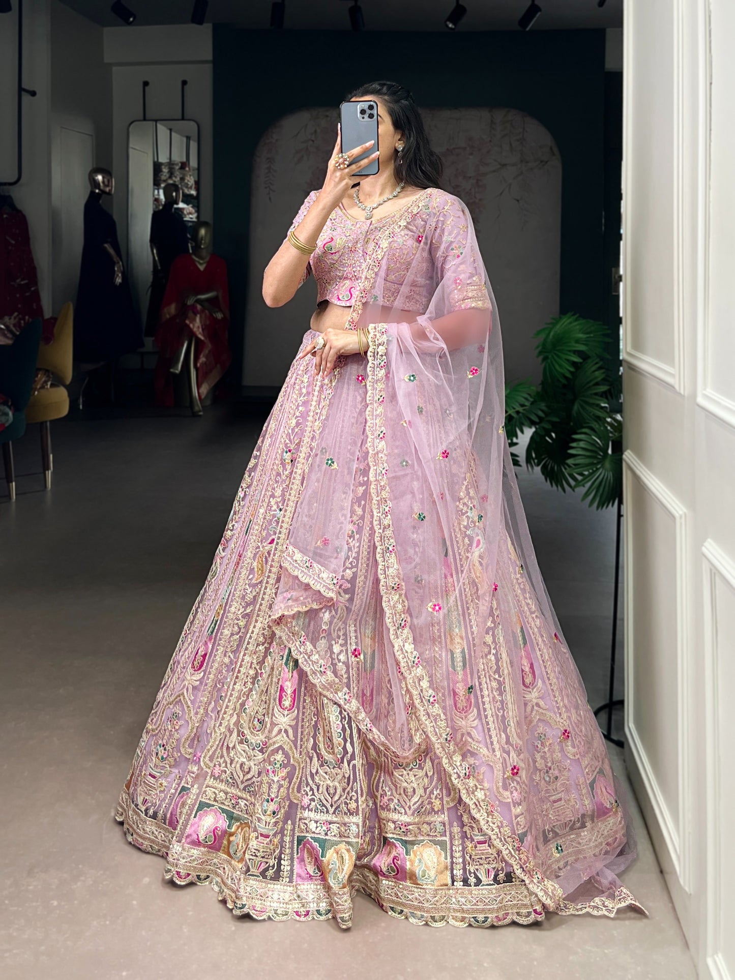 Women's Lehenga Choli in Lavender Net with Sequins and Thread Embroidery