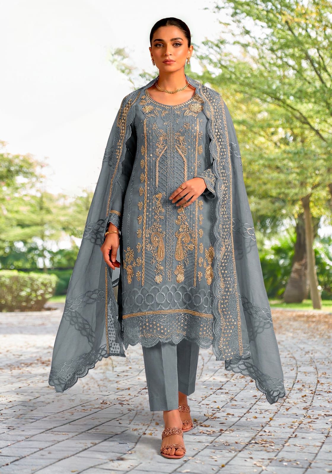 Designer stylish suit crafted in IMP CRYSTAL CHIFFON with elegant embroidery and  pure handwork.