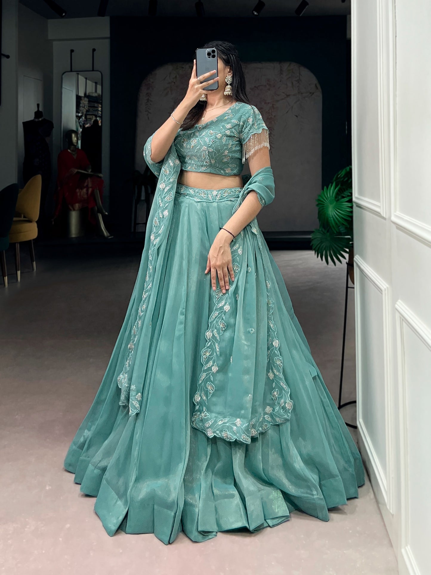 Women's Lehenga Choli in Aqua Blue Gold Coin Fabric with Beads and Thread Embroidery