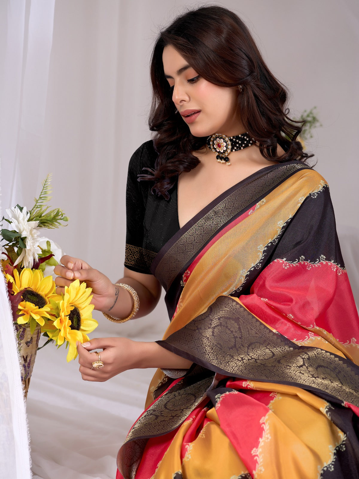 Women's Soft Lichi Silk Saree in Black, Mustard Yellow and Coral Pink with Patola-Inspired Woven Border