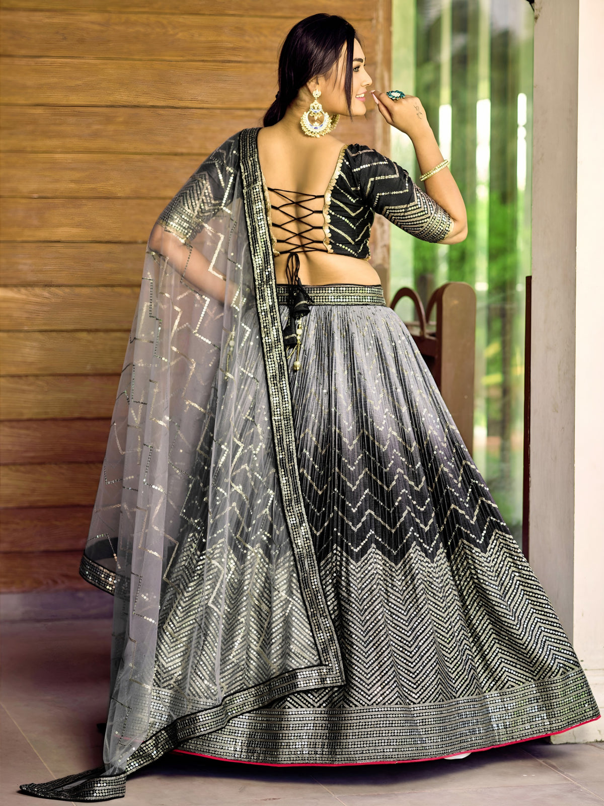 Women's Lehenga Choli in Black Chinnon with Thread and Sequins Embroidery