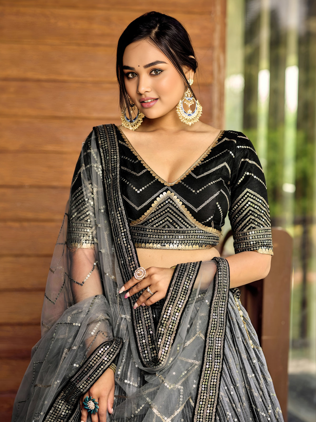 Women's Lehenga Choli in Black Chinnon with Thread and Sequins Embroidery