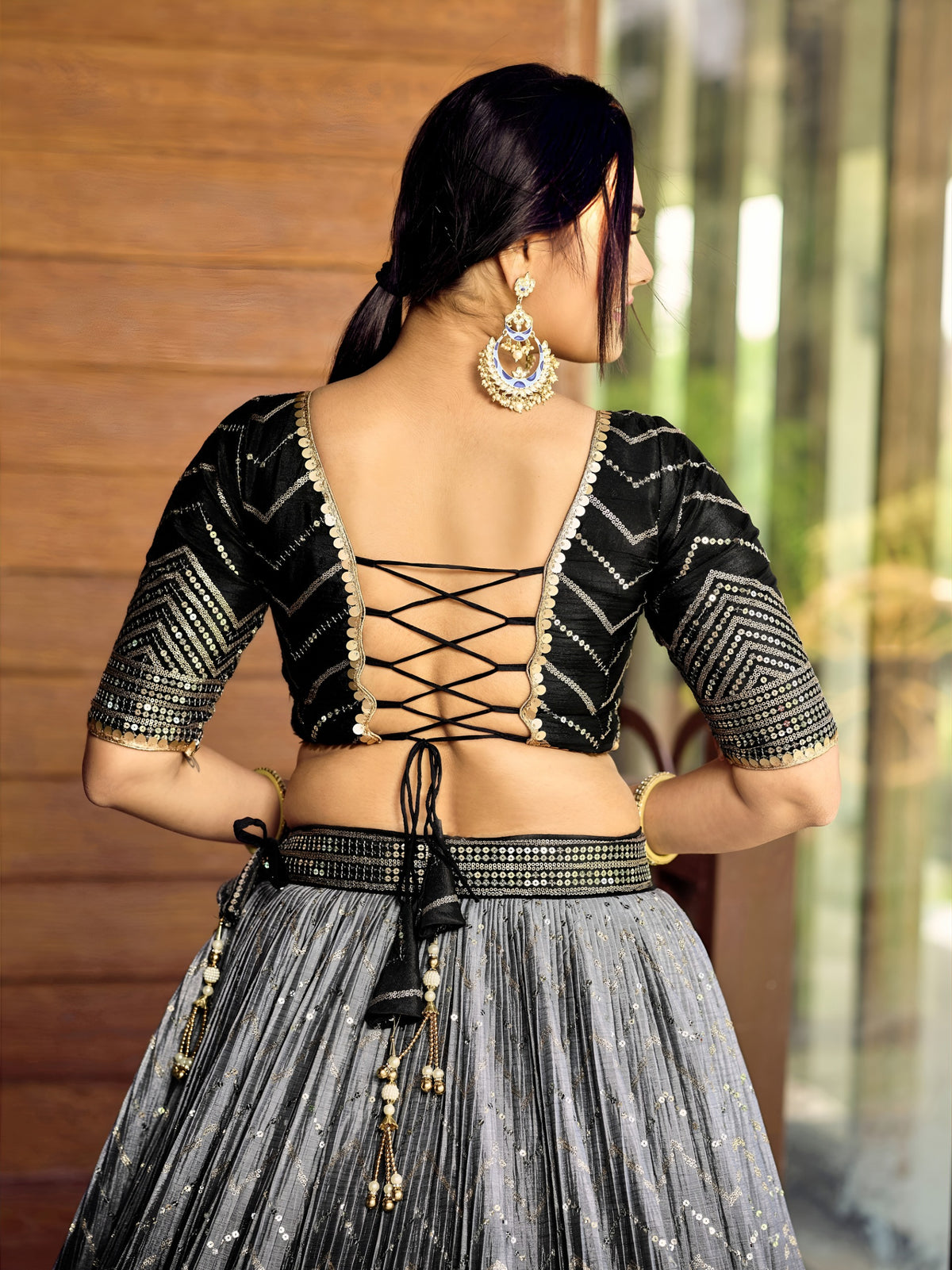 Women's Lehenga Choli in Black Chinnon with Thread and Sequins Embroidery