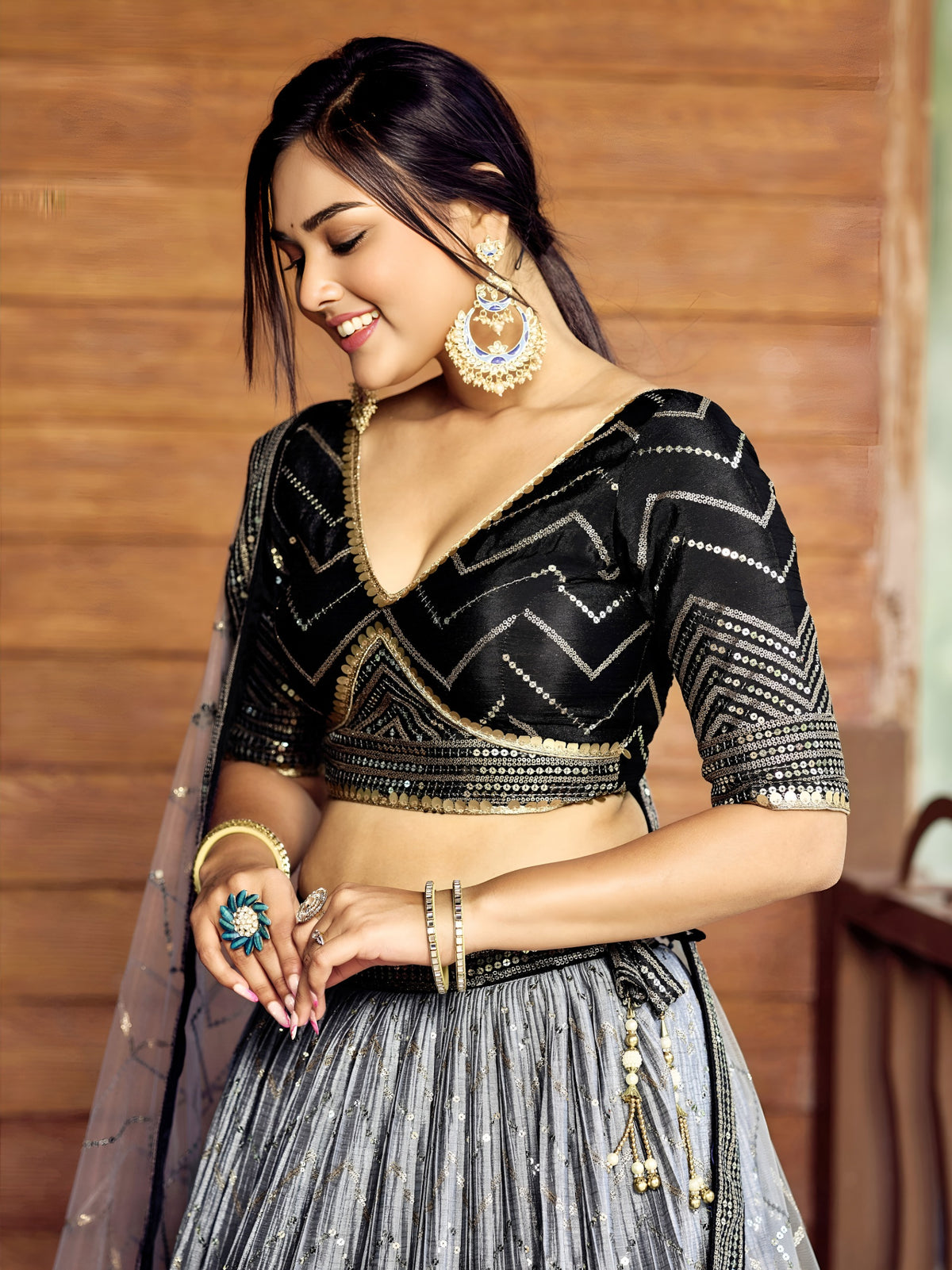 Women's Lehenga Choli in Black Chinnon with Thread and Sequins Embroidery