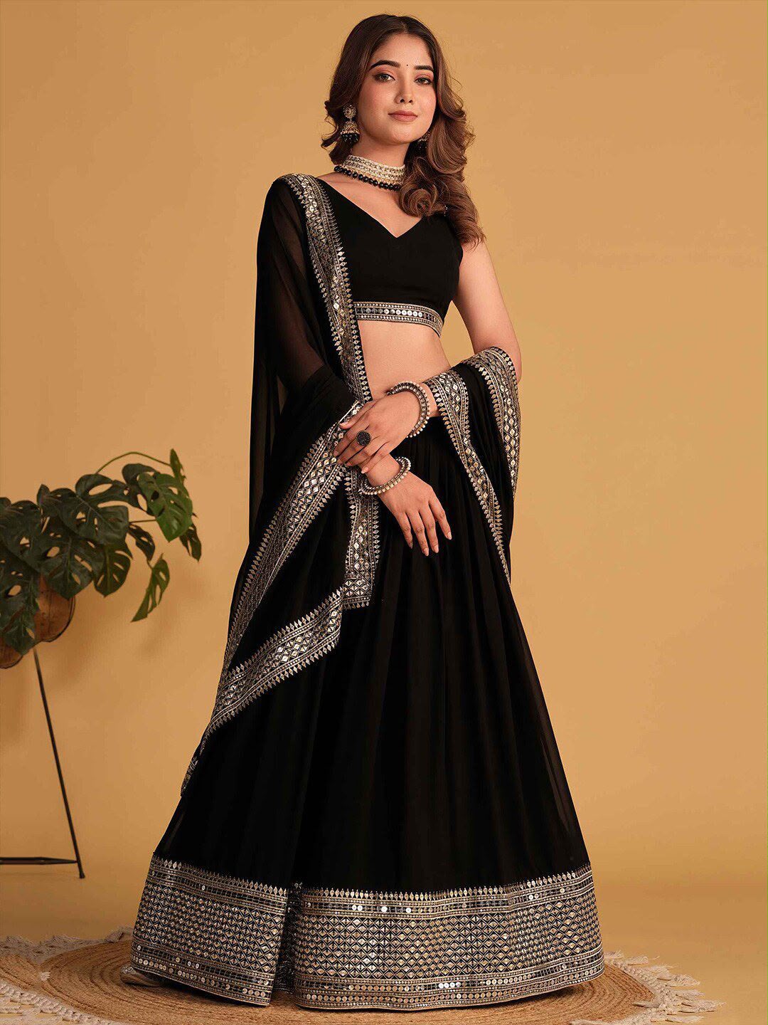 Women's Lehenga Choli Set in Rani Pink & Black Faux Blooming Fabric with Sequin Embroidery