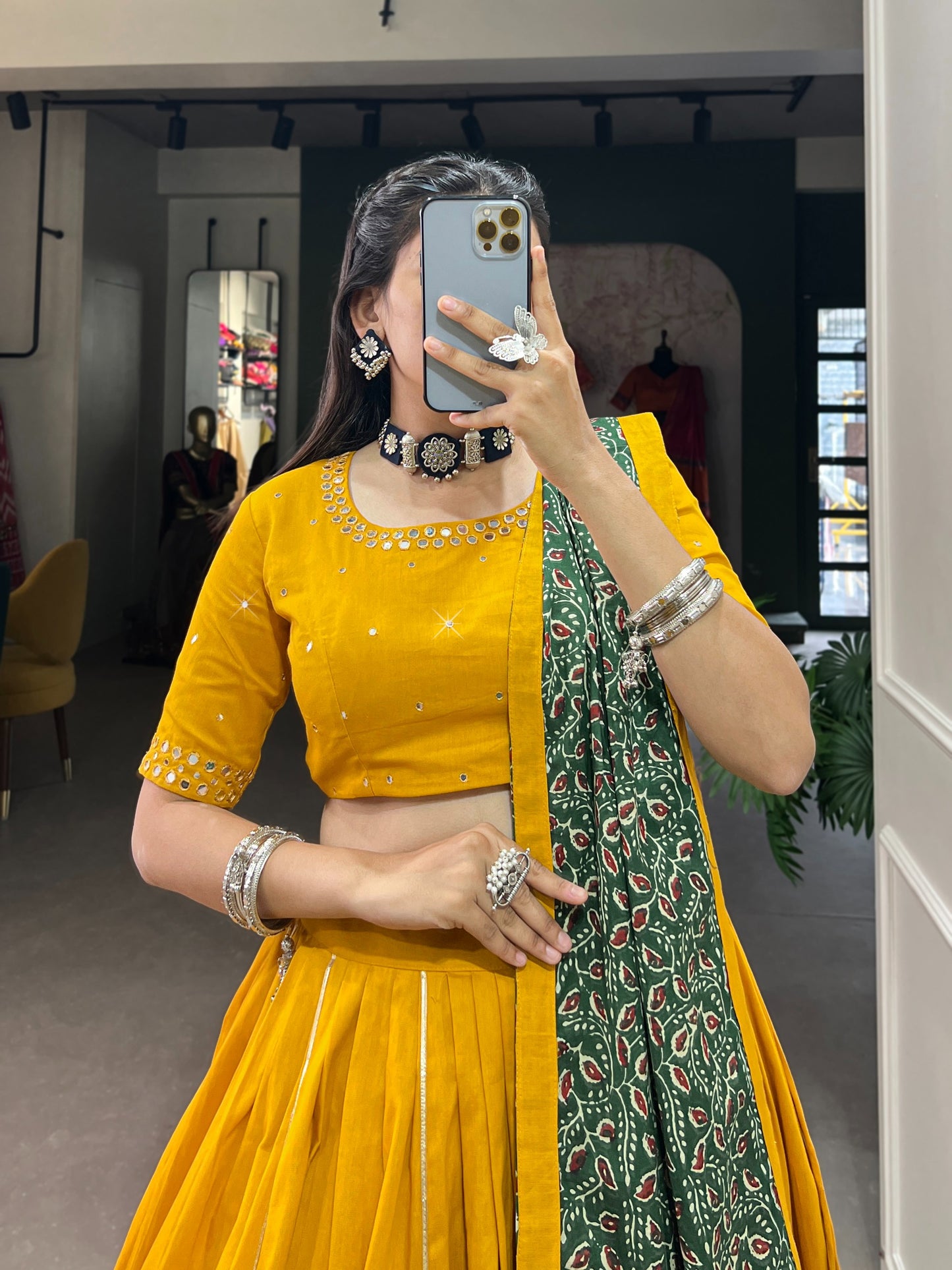 Dance through Navratri nights in this beautifully printed pure cotton lehenga choli. Complete with a matching purse and intricate coin lace detailing, it's perfect for the celebrations! 🥰
