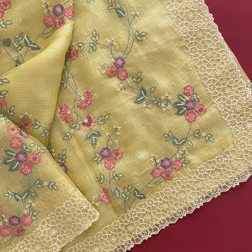 Pastel Organza Saree with Floral Embroidery and Chikankari-Style Lace Borders