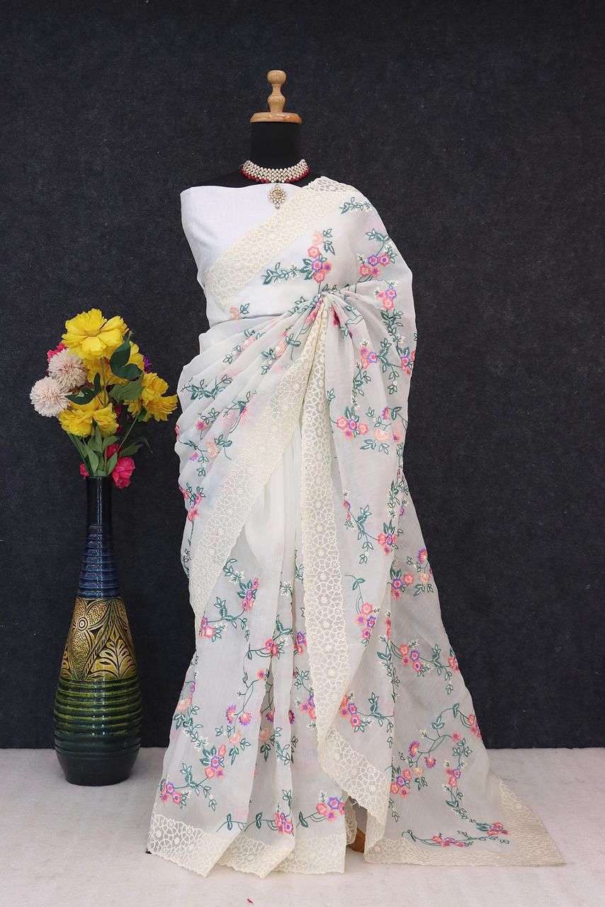 Pastel Organza Saree with Floral Embroidery and Chikankari-Style Lace Borders