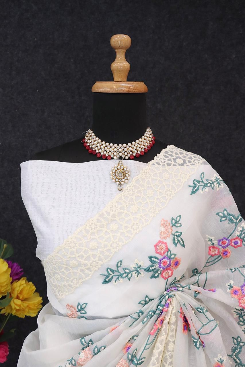 Pastel Organza Saree with Floral Embroidery and Chikankari-Style Lace Borders