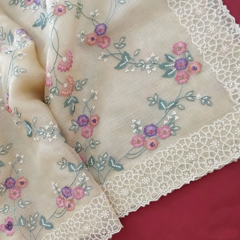 Pastel Organza Saree with Floral Embroidery and Chikankari-Style Lace Borders