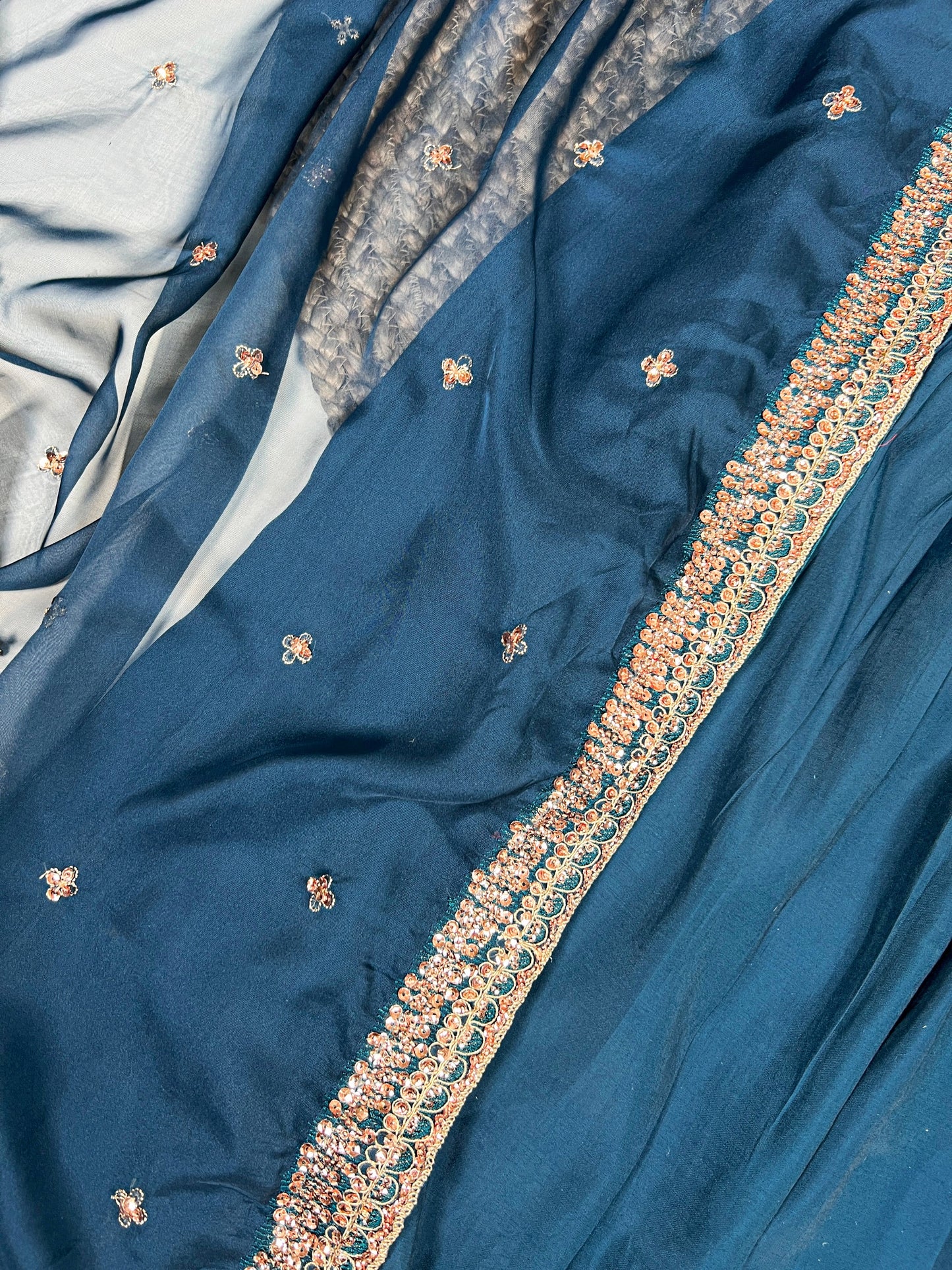 Let the smooth fall of Roman silk enhance your style with its classic charm and graceful finish 🦋