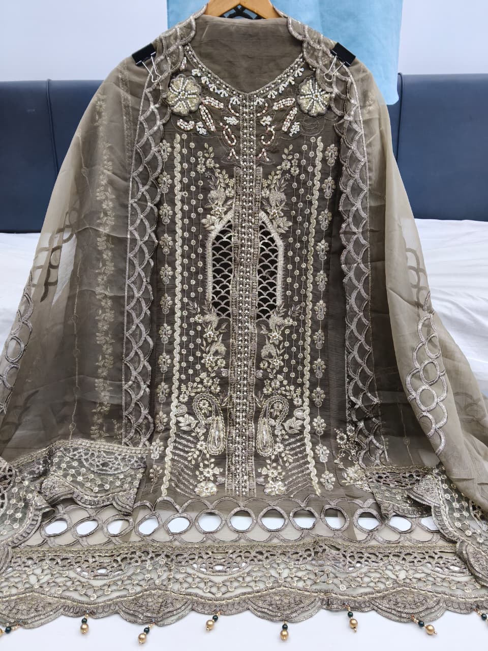 Designer stylish suit crafted in IMP CRYSTAL CHIFFON with elegant embroidery and  pure handwork.