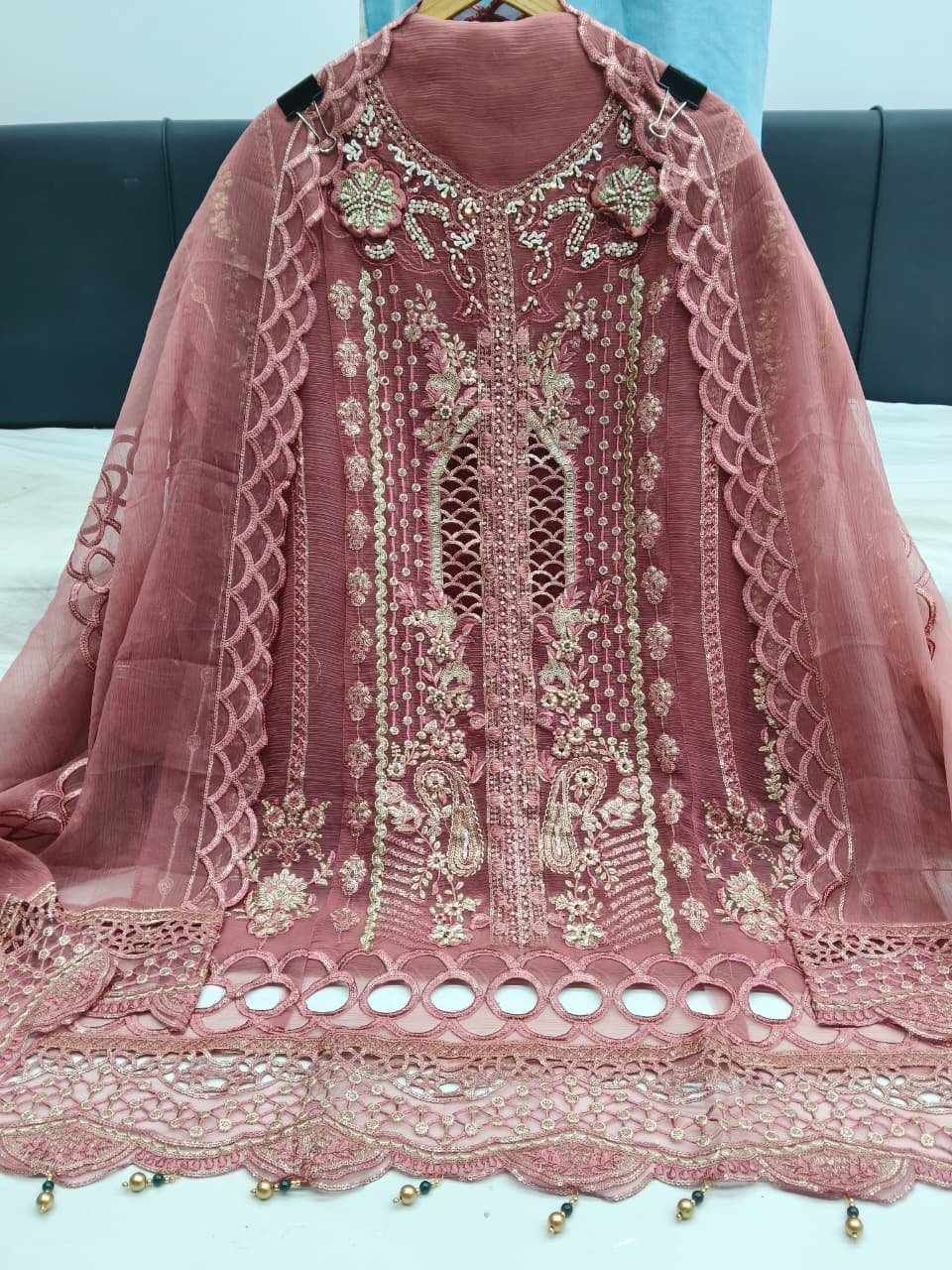 Designer stylish suit crafted in IMP CRYSTAL CHIFFON with elegant embroidery and  pure handwork.