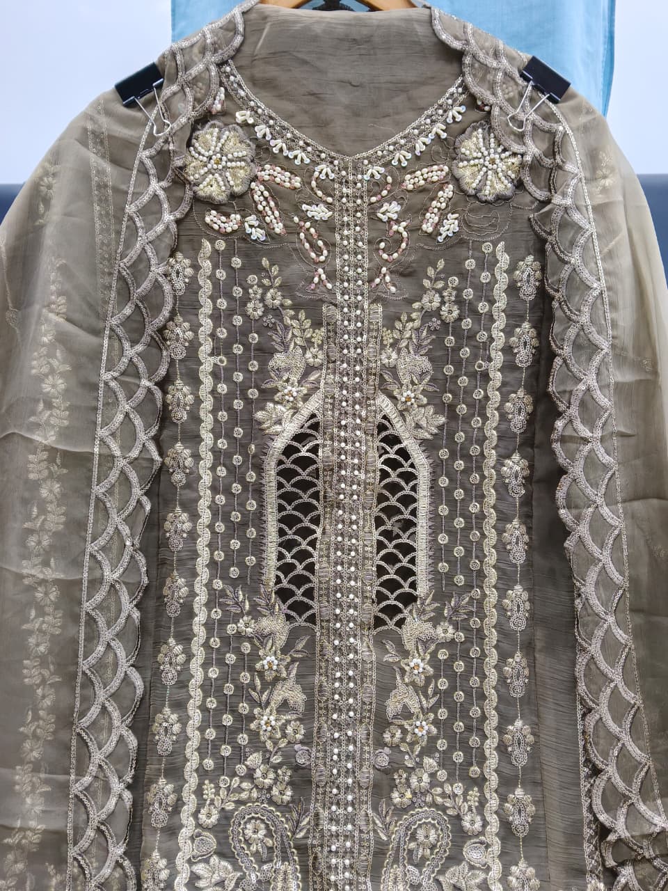 Designer stylish suit crafted in IMP CRYSTAL CHIFFON with elegant embroidery and  pure handwork.