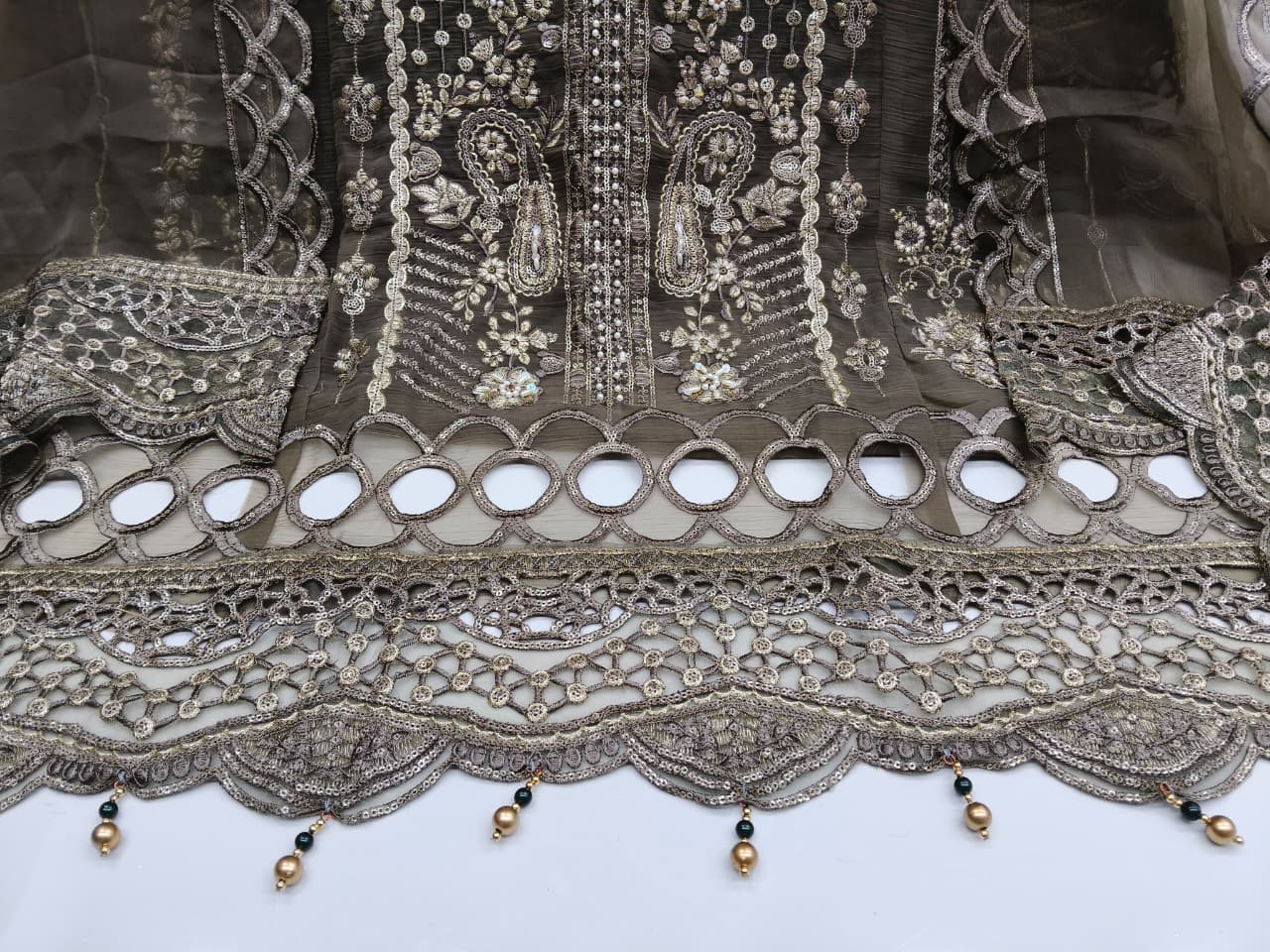 Designer stylish suit crafted in IMP CRYSTAL CHIFFON with elegant embroidery and  pure handwork.