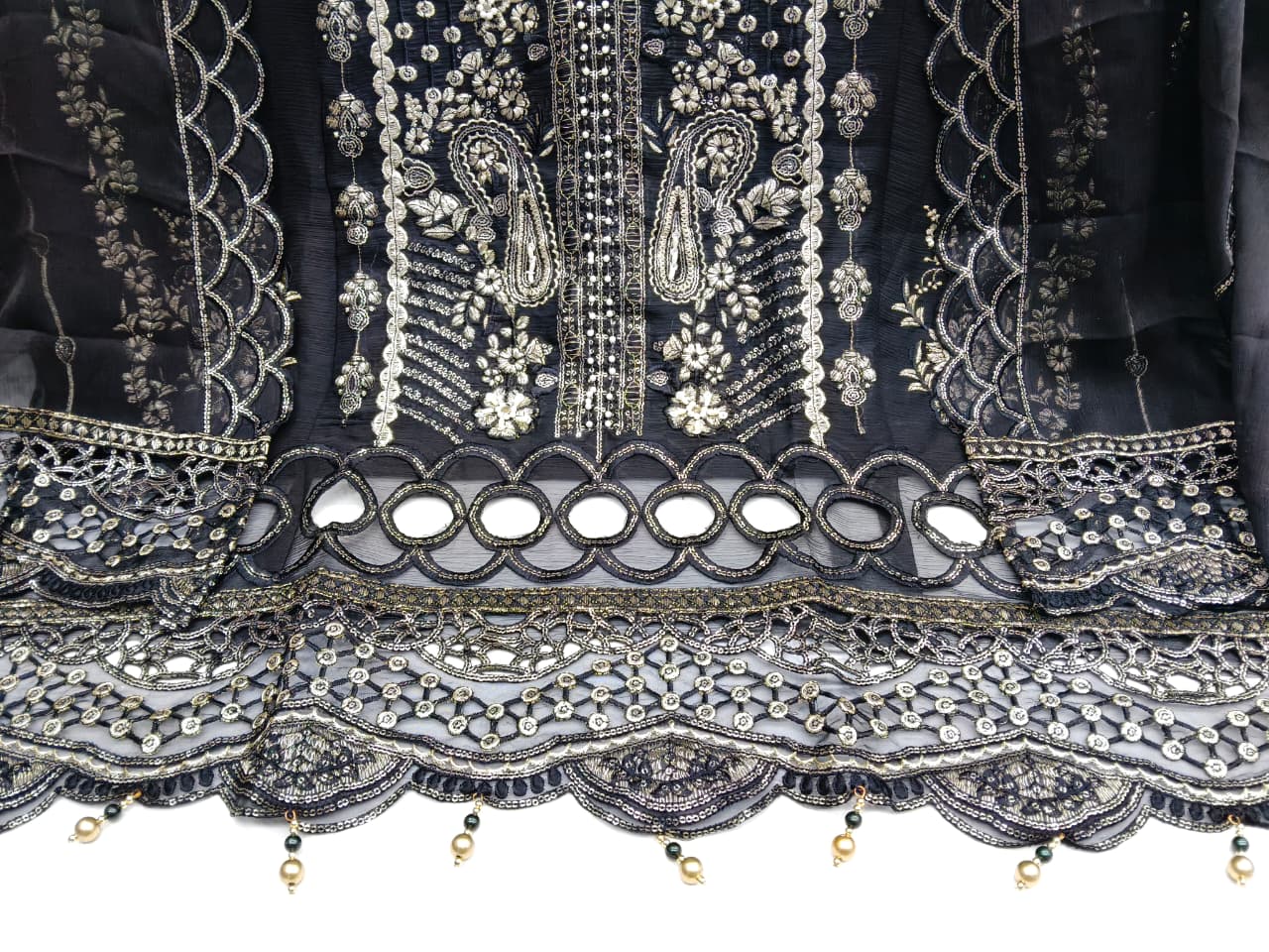 Designer stylish suit crafted in IMP CRYSTAL CHIFFON with elegant embroidery and  pure handwork.