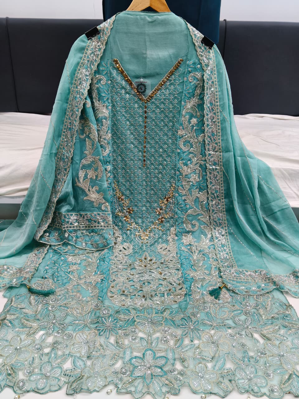 Women's Semi-Stitched Chiffon Pakistani Suit Catalog Set in Assorted Colors with Heavy Embroidery and Laser Cutwork