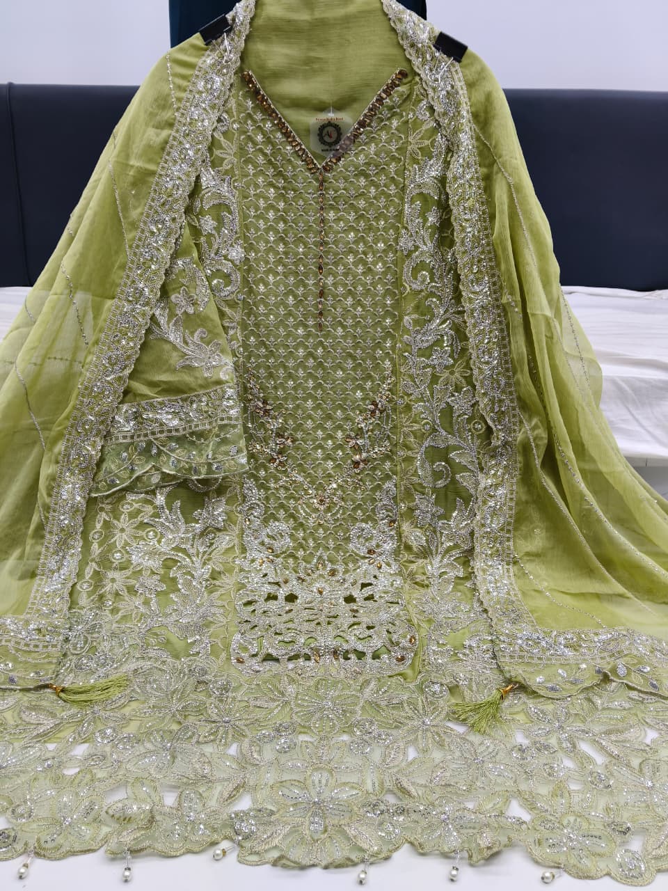 Women's Semi-Stitched Chiffon Pakistani Suit Catalog Set in Assorted Colors with Heavy Embroidery and Laser Cutwork
