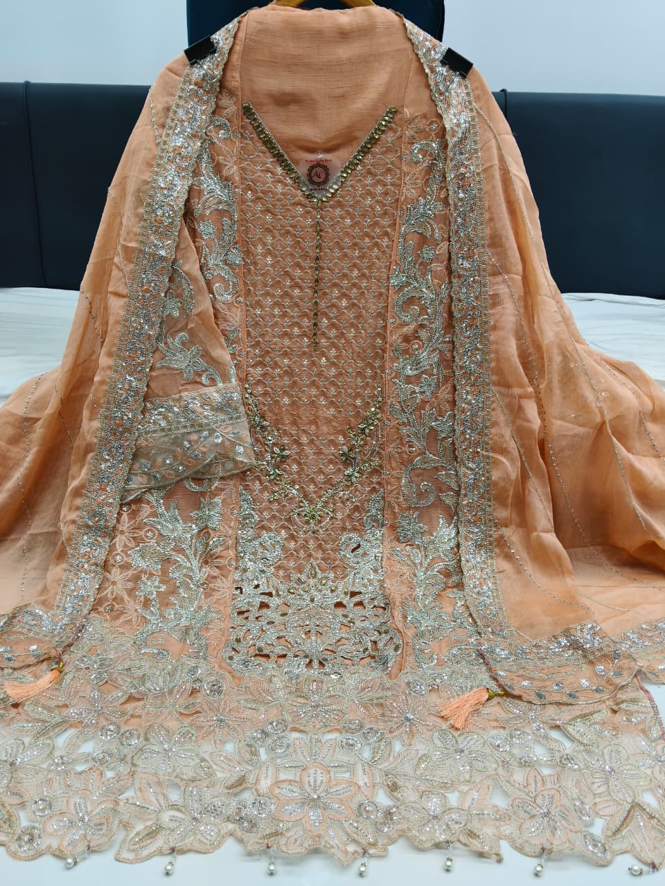 Women's Semi-Stitched Chiffon Pakistani Suit Catalog Set in Assorted Colors with Heavy Embroidery and Laser Cutwork