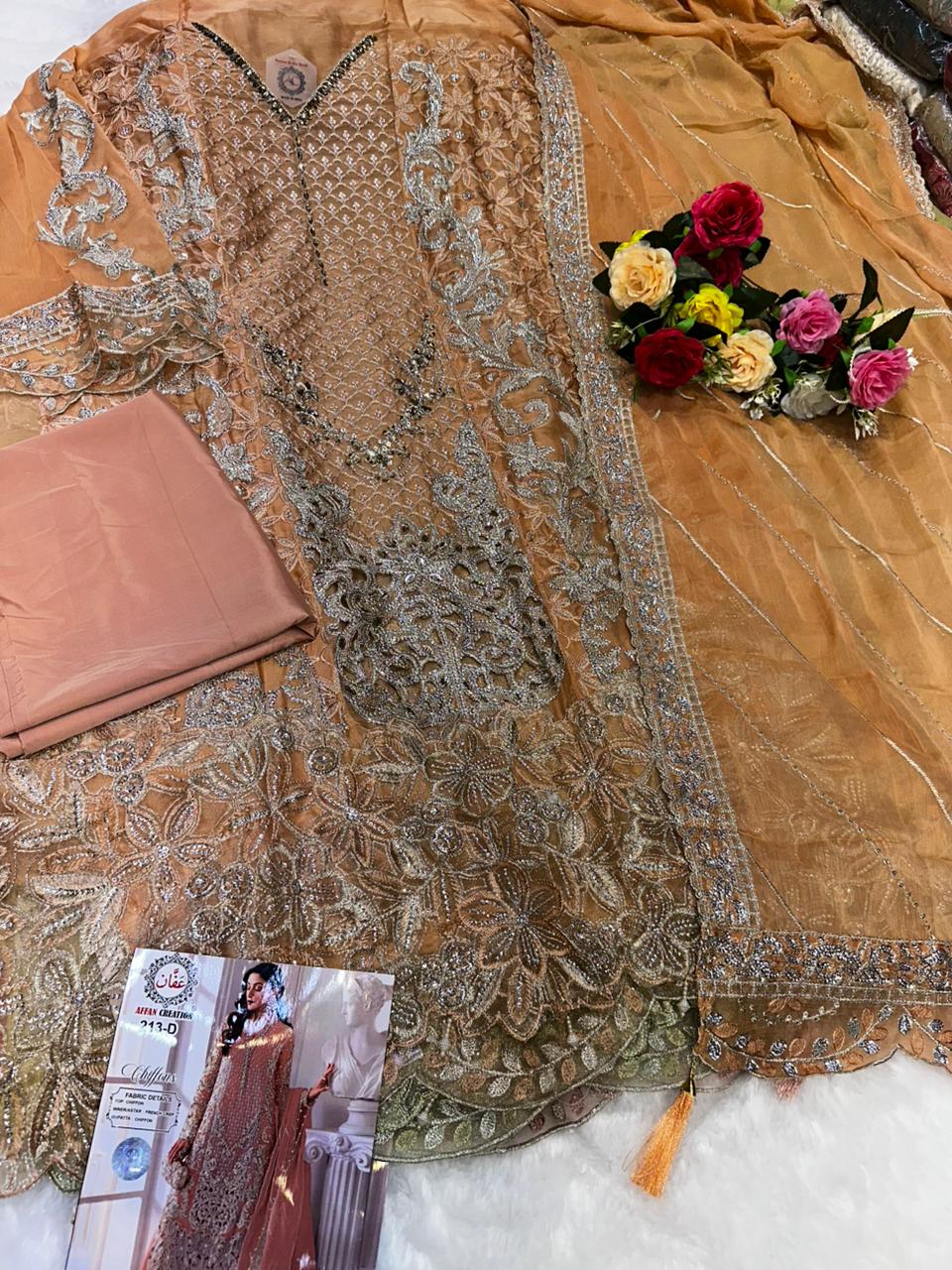Women's Semi-Stitched Chiffon Pakistani Suit Catalog Set in Assorted Colors with Heavy Embroidery and Laser Cutwork