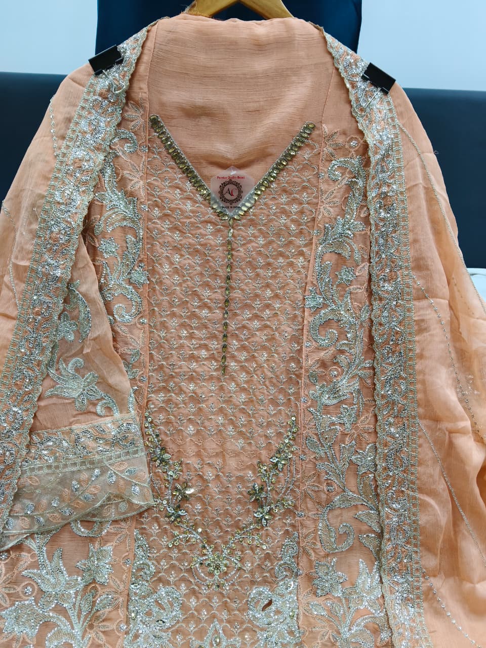 Women's Semi-Stitched Chiffon Pakistani Suit Catalog Set in Assorted Colors with Heavy Embroidery and Laser Cutwork