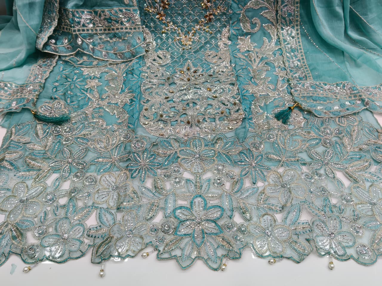 Women's Semi-Stitched Chiffon Pakistani Suit Catalog Set in Assorted Colors with Heavy Embroidery and Laser Cutwork