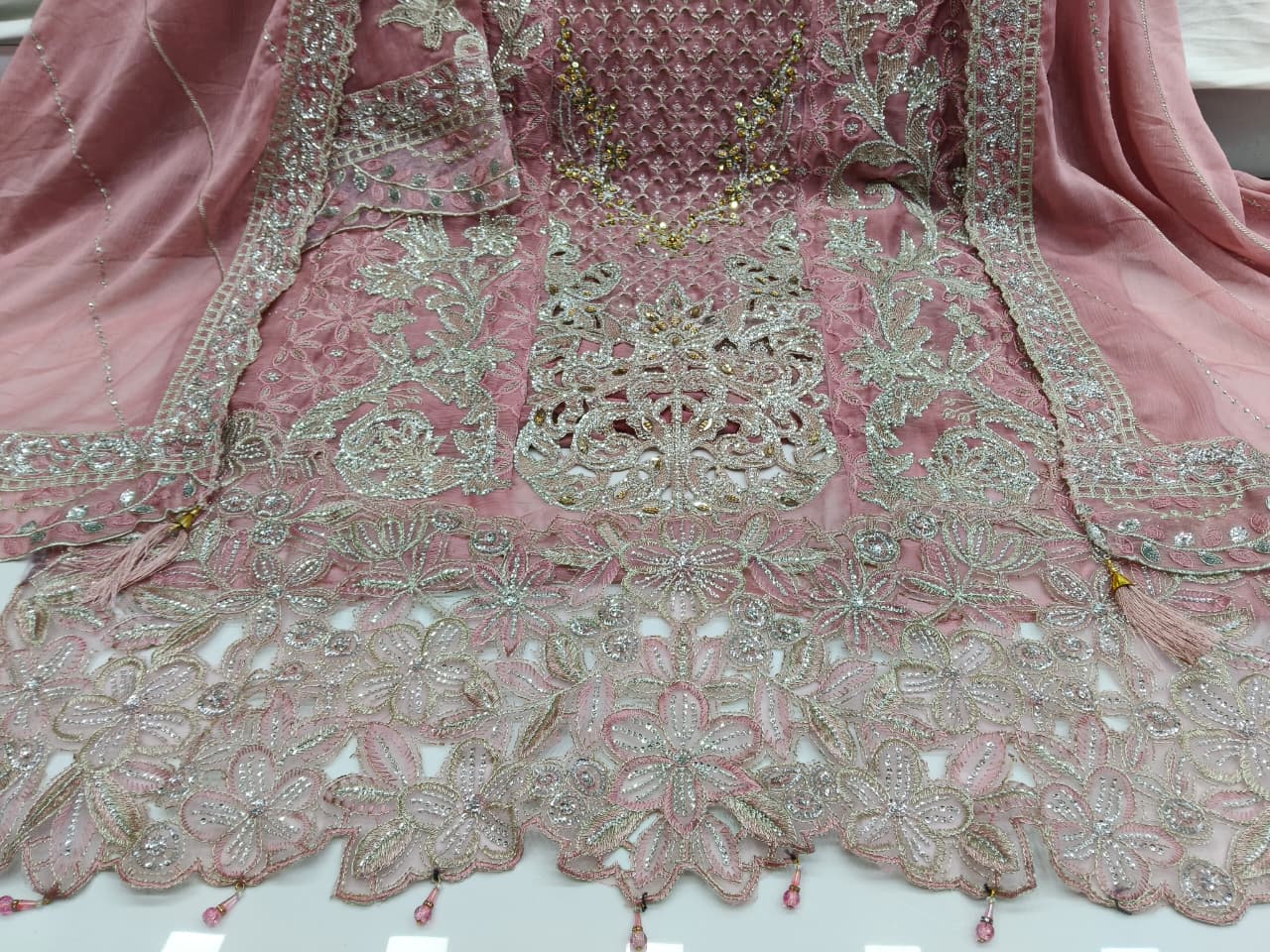 Women's Semi-Stitched Chiffon Pakistani Suit Catalog Set in Assorted Colors with Heavy Embroidery and Laser Cutwork