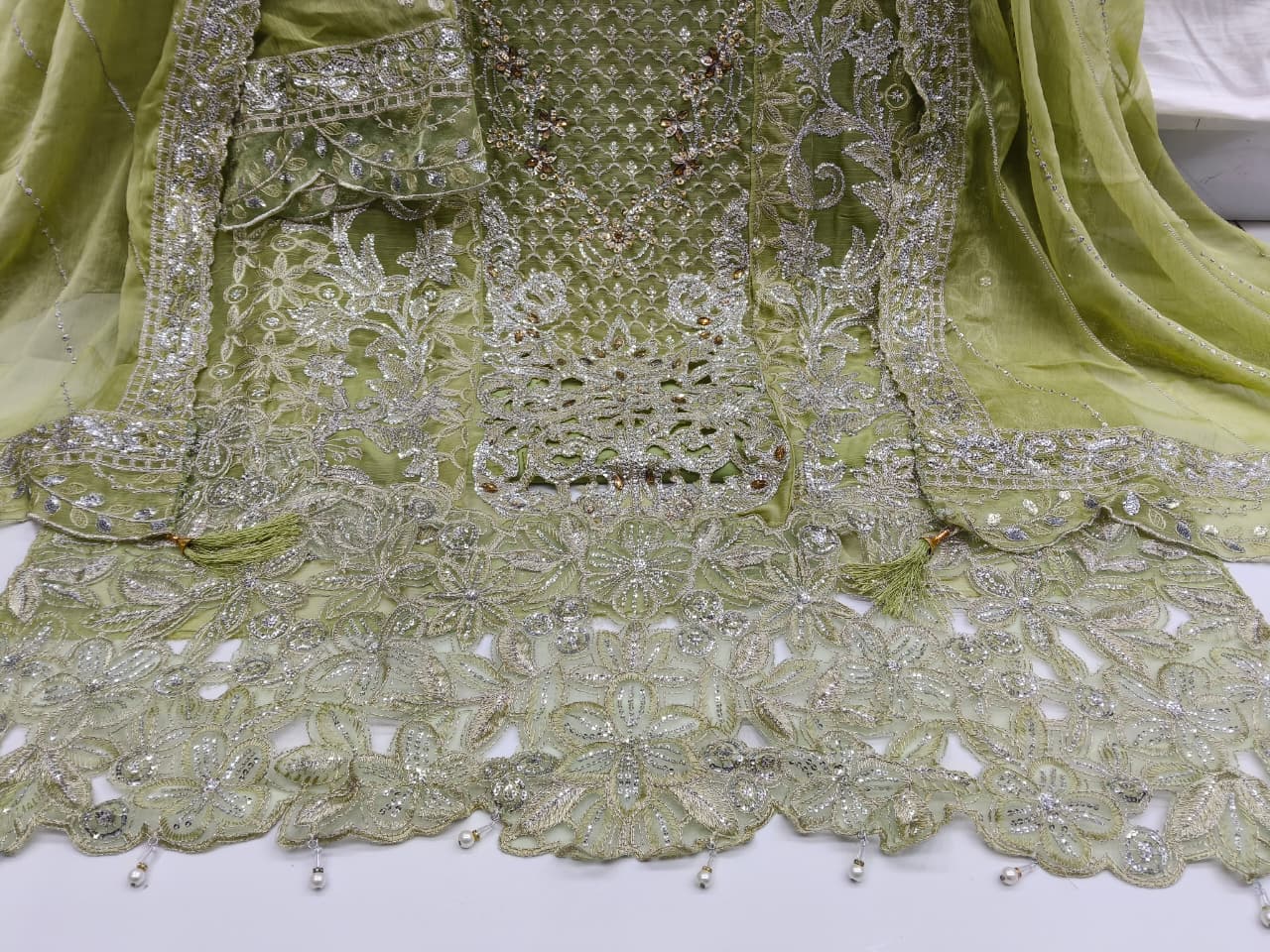 Women's Semi-Stitched Chiffon Pakistani Suit Catalog Set in Assorted Colors with Heavy Embroidery and Laser Cutwork